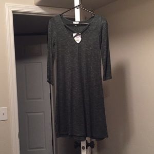 Medium sleeved green dress; great with leggings!
